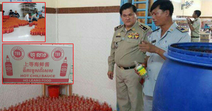 打击造假委员会突袭黑心工厂，查获大批“黑心”酱料。